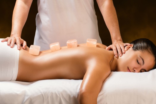 Massage with himalayan hot stones