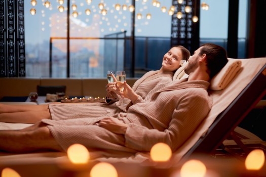 Two people relaxing at the spa on recliners